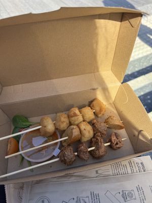 Skewers, satay sauce, popcorn chicken - sausage & mushroom something   at Coca bar in Maroochydore