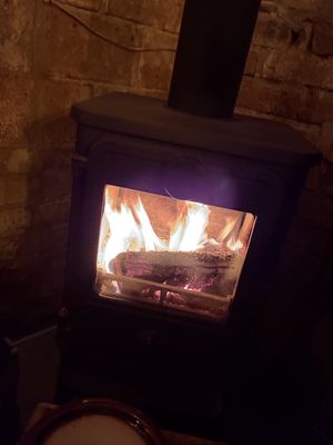 Oven in seating area  at Kaffeehaus Krumm & Schief in Bamberg