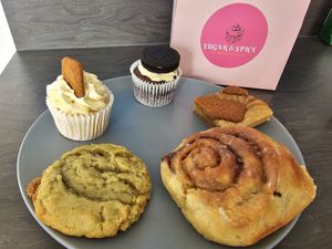 Full box of vegan goodies (biscoff blondie&cake, cinnamon roll,  oreo cake, vg white choc and pistachio cookie and I ate the slice of Victoria sponge! at Sugar & Spice by S in Coventry