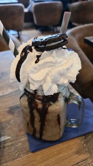 Oreo Frappe with whipped cream and chocolate sauce! at Mojo Coffee in Bremerhaven