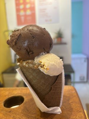 Chocolate sorbet and peanut butter ice cream waffle cone   at Juno's Gelato in Palolem