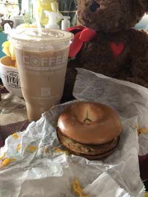 Large Iced Spiced Chai latte and vegan breakfast sandwich (vegan egg, cheese and meatless patty)  at Coffee Connection in Providence