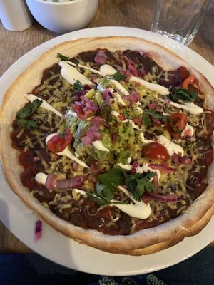 Vegan tortillas with avocado, cheese, sour cream, refried beans and salsa picante   at Moose Coffee in Liverpool