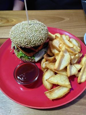 Vegan burger with fries, BBQ sauce, tofu, vegan mayonaisse and fresh vegetable. at Krakovc in Ljubljana