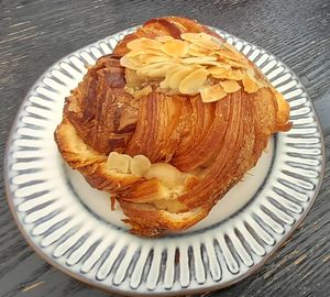 Almond Crossiant made by WHIP Patisserie at Loving Hut Perth in Wembley