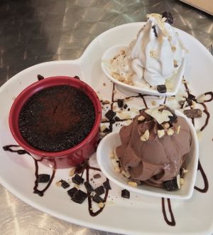 Chocolate lava cake with soft serve ice cream at Loving Hut Perth in Wembley