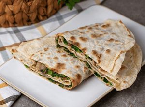 Jengyalov Hac with mushrooms: flour, salt, vegetable oil, mushrooms, herbs for jengyalov hac. at SAS Food Court in Yerevan