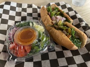 Chik’n cheesesteak and a side of kale salad.  at rooted AF in Wilmington