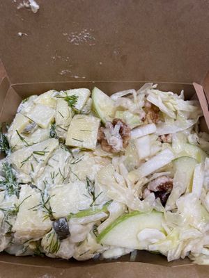 Potato salad on the left and slaw with apple and walnuts on the right  at Mandala VGF in Wynnum