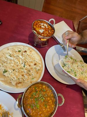Garlic bread, fried rice with peas, sweet and spice vegetable fried balls, salty lentils at Taj Mahal in Santander