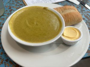 Broccoli and curried cauliflower soup, with bread and vegan butter  at KILN Cafe by Mac in Birmingham