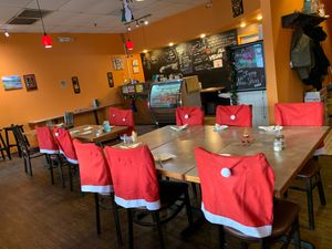 Chairs decorated for Christmas at Lai Thai Kitchen in Grand Rapids