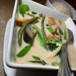 Green Curry: Tofu, String Beans, Eggplant, Bell Peppers, Bamboo Shoots, Basil Leaves, Thai Herbs & Spices at Lai Thai Kitchen in Grand Rapids