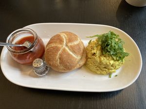 Scrambled tofu, tomato relish, GF bread   at Café Naiv in Innsbruck