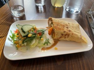 Half of a Röstiburrito. They offered to serve it on two plates   at Café Naiv in Innsbruck