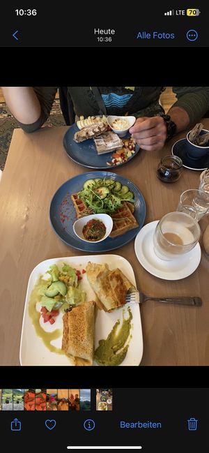 Sweet and hearty waffles and break burrito on the bottomm  at Café Naiv in Innsbruck