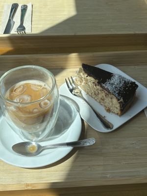 Iced latte + coconut cake   at Café Naiv in Innsbruck