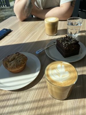 Cake muffin and lattes with oat milk   at Feast & Fallow in Vancouver