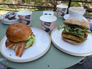 BLAT - baking, lettuce, avocado and sun-dried tomato on brioche.  Get it on ciabatta next time.  Double chocolate croissant in upper left corner.   Italian tofu sandwich on right   at Little Loaf Bakeshop in New Paltz