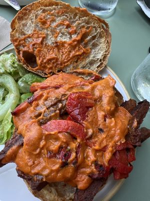 Steak and cheese sando with oat cheese.   Ask for less sauce.  I also left out the onions. They are happy to accommodate and their kitchen is really quick, too    at Little Loaf Bakeshop in New Paltz