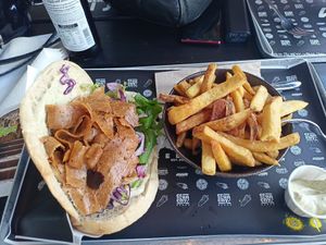 Menu with kebab in bread, fries and a drink at Crunchy Kebab in Kassel