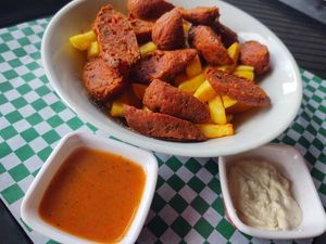 Salchipapa vegana at La Villa 99 in Bogota