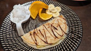 Banana roti w/coconut icecream $11.90 at Madame K's Vegetarian in Fitzroy