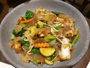 Pad see ew (they dont use the good pork anymore, now it's floppy gross chikn; also word is the new owners are going to rebrand to non-vegan in couple months) at Madame K's Vegetarian in Fitzroy