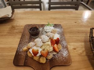 Hong Kong-style waffles with strawberries, whipped cream and chocolate sauce at Kem-Kon - Khon Kaen (เข้ม-ข้น ขอนแก่น) in Khon Kaen