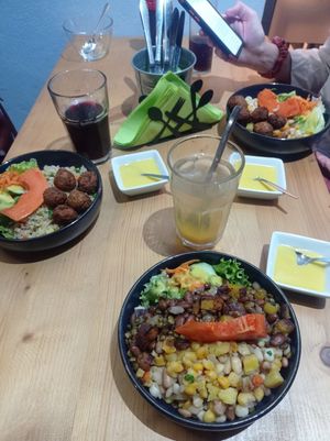 Asian rice with falafel, cachupa with vegan protein, cachucha with falafel at Nha Gost in Santa Maria