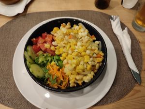 Cachupa with salad at Nha Gost in Santa Maria