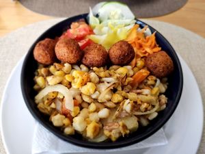 Cachoupa with falafel. at Nha Gost in Santa Maria