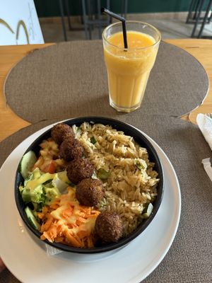 Rice with vegetables and falafels and salad. Smoothie   at Nha Gost in Santa Maria