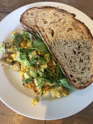 Scrambled tofu with tomatoes and mushrooms   at Kawa Cafe in Surry Hills