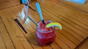 Hibiskey Sour (amazing) Bourbon, hibiscus syrup, charcoal bitters, and fresh lemon juice. at Sexi Mexi Burrito Bar in Winchester