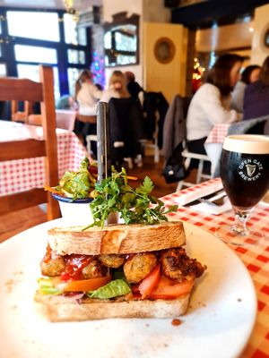 Falafel Burger with Sweet Potato Fries
Rustic Relish & Onion Ring Stack on
Sourdough Bap at Nancy's Barn in Ballyliffin