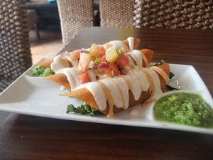 Coconut kale enchiladas. $13. Very flavorful. I would have them again. at Be Raw Food and Juice in Dallas