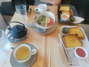 Chia and turmeric toast, coconut and mango bowl at Aguacate in Jerez