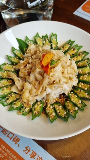 Cold okra dish — the noodle-like thing in the middle is actually a type of mushroom. It comes with a sauce, too. Loved this one! at Baiyi Vegetables Lanzhou Sulamian - 百易素食·素拉面（元大都店) in Beijing