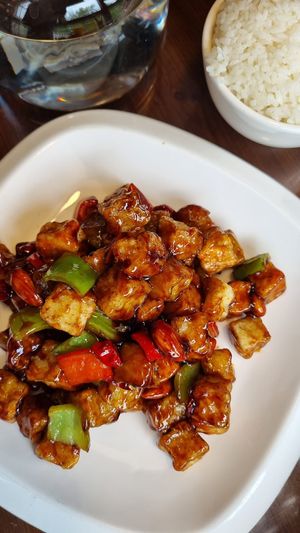 Eggplant, bell peppers, and almonds in a sweet-and-sour sauce. A bit too sweet for my taste, but still good :) at Baiyi Vegetables Lanzhou Sulamian - 百易素食·素拉面（元大都店) in Beijing