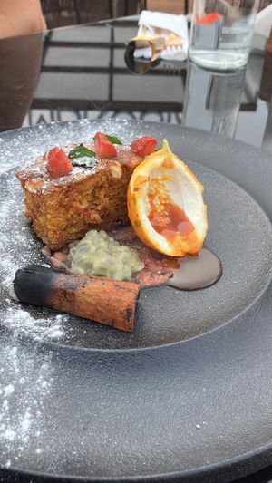 Carrot cake with passionfruit, grapefruit and caramel at Le Ambrosia in New Delhi