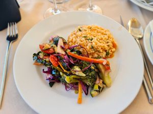 Tomato rice and sautéed veggies at Restaurante Dom Fernando in Gafanha Da Encarnacao