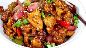 Chili Gobi:
Fried breaded cauliflower with chili peppers, onion, and soy sauce. at Tandoor King Indian Restaurant in Karlovy Vary