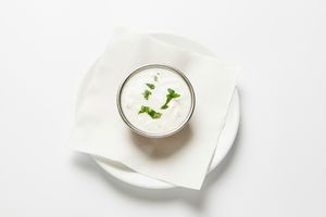 Raita:
Yogurt with finely chopped cucumber, tomato, onion, and fresh coriander leaves. at Tandoor King Indian Restaurant in Karlovy Vary