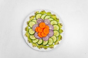 Green Salad:
Fresh tomato, cucumber, red onion, and lemon. at Tandoor King Indian Restaurant in Karlovy Vary