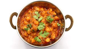 Chana Masala:
Chickpeas are prepared with Indian spices and herbs. at Tandoor King Indian Restaurant in Karlovy Vary