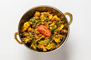 Vegetable Bhuna:
Slightly spicy thick sauce with tomatoes, onions, and peppers. at Tandoor King Indian Restaurant in Karlovy Vary