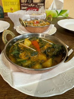 Saag Aloo:
Saag aloo is a classic Indian-style side dish featuring potatoes fried in spices and spinach. at Tandoor King Indian Restaurant in Karlovy Vary