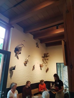 stuffed animals on the wall at De Veldkeuken in Bunnik