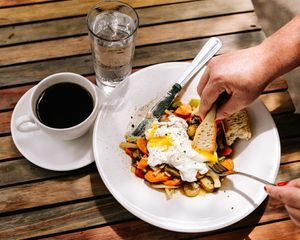 Vegetable Hash with Smoked Onion Broth - comes with poached eggs!  at Barbette in Minneapolis